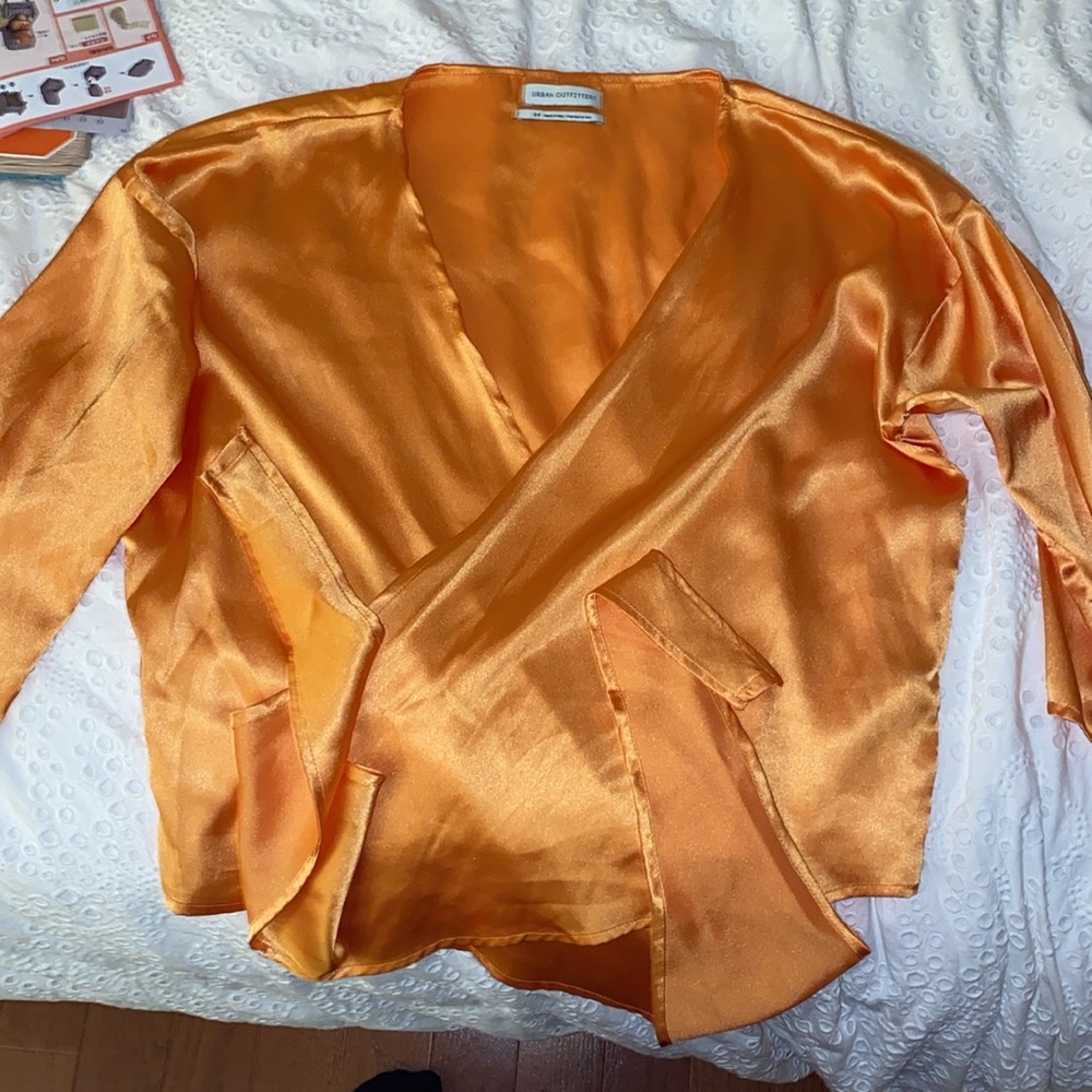 Urban outfitters orange wrap satiny going out top